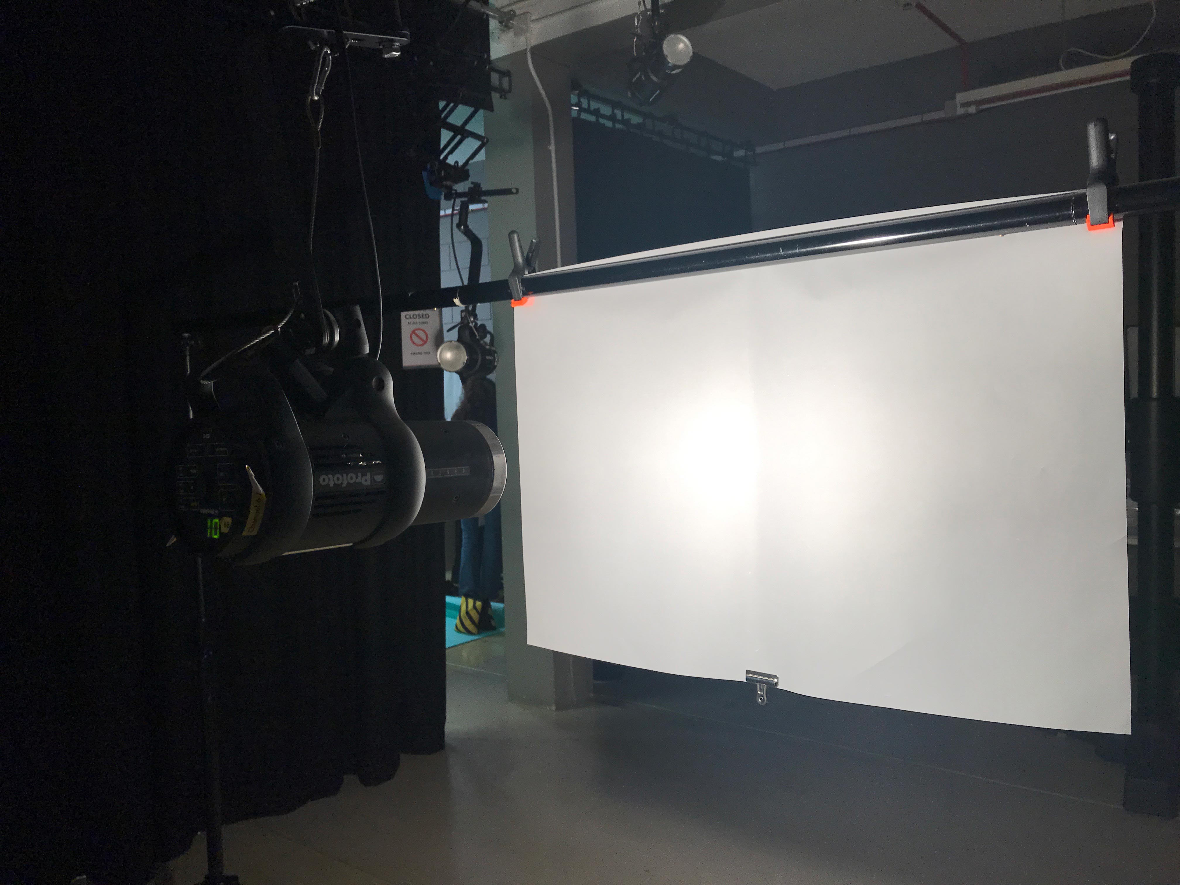 photo of a photography studio, light against tracing paper